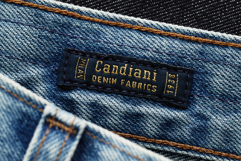 Candiani denim label on a blue denim fabric