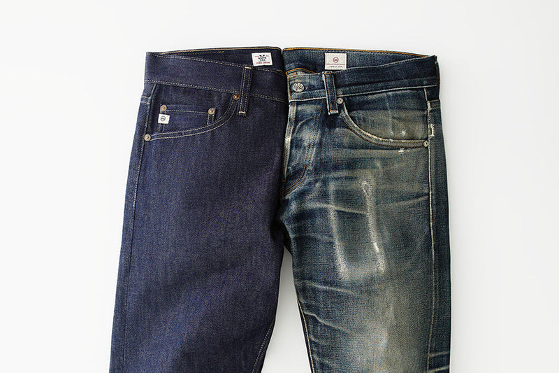 Two pairs of blue jeans, one worn and one unworn, on a white background.