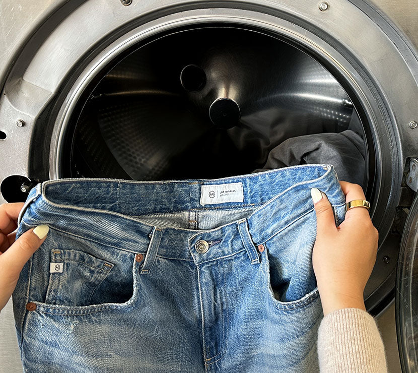 Jeans going into the washing machine