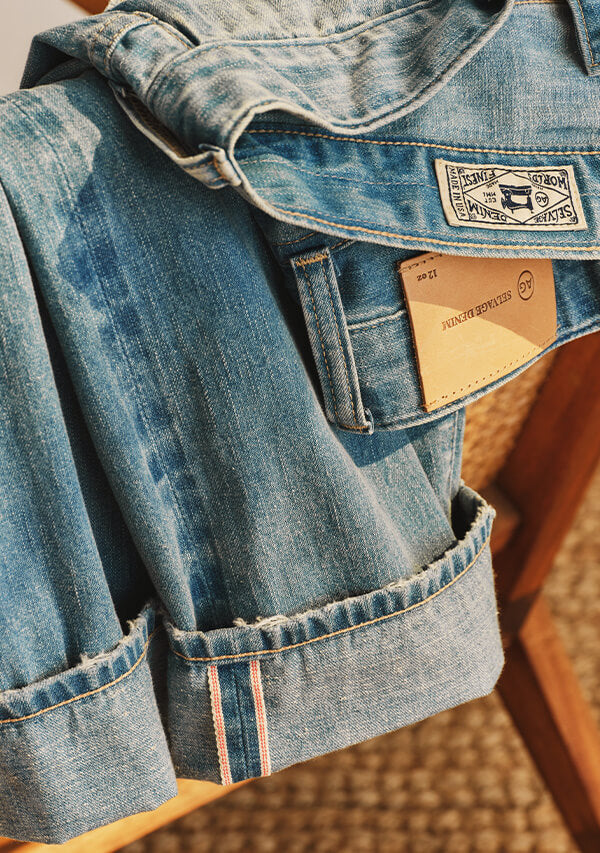 Blue selvage jeans on chair
