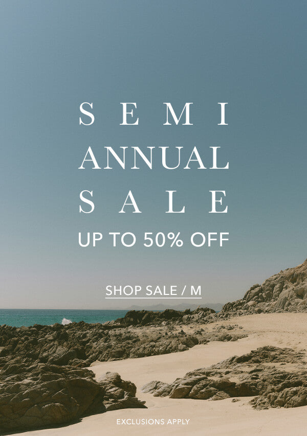 Beach scene with 'Semi Annual Sale' text overlay