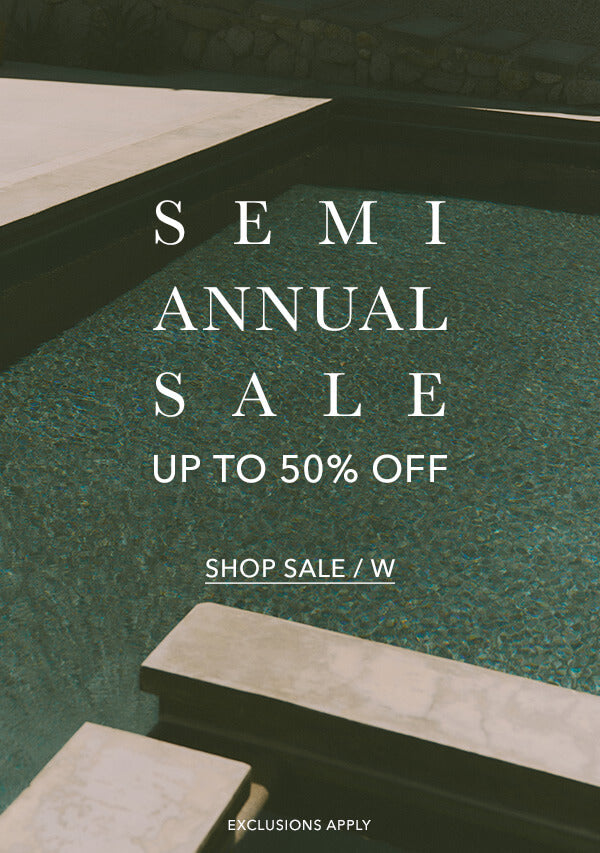 Semi-annual sale with text overlay on a blurred background