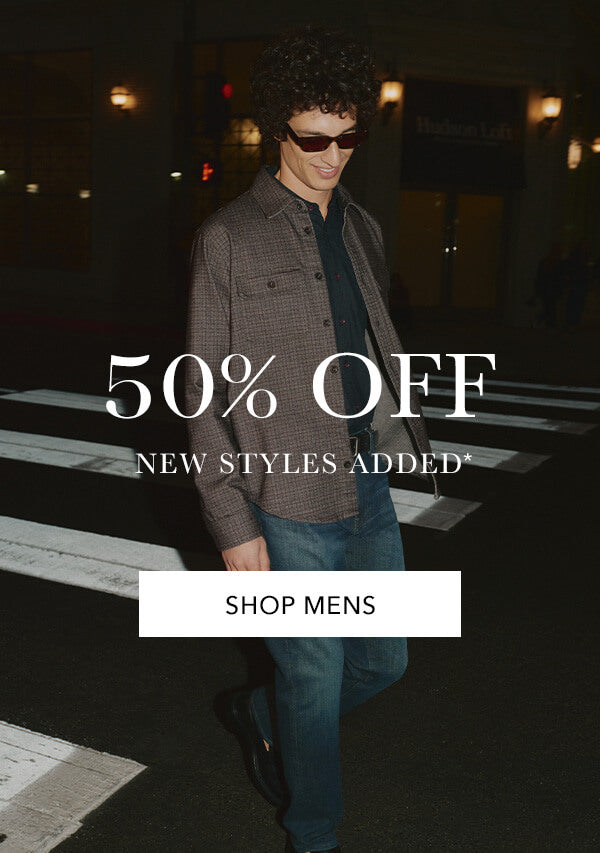 Man walking on a street at night with promotional text overlay