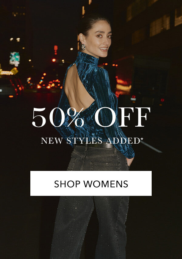 Woman wearing a blue velvet top with a backless design on a city street at night, with promotional text overlay.