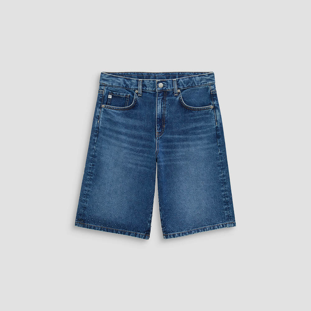 Blue denim shorts on a light gray background