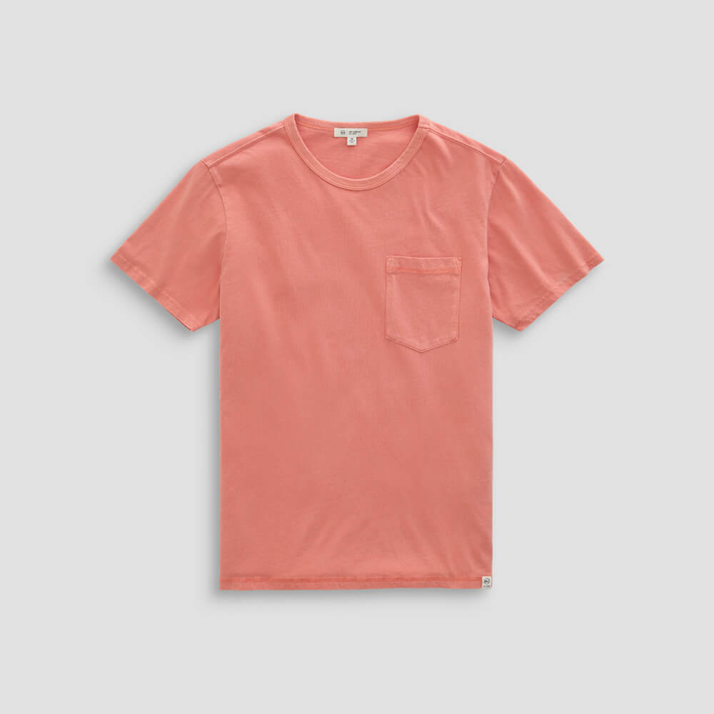 Coral t-shirt with a pocket on a light gray background
