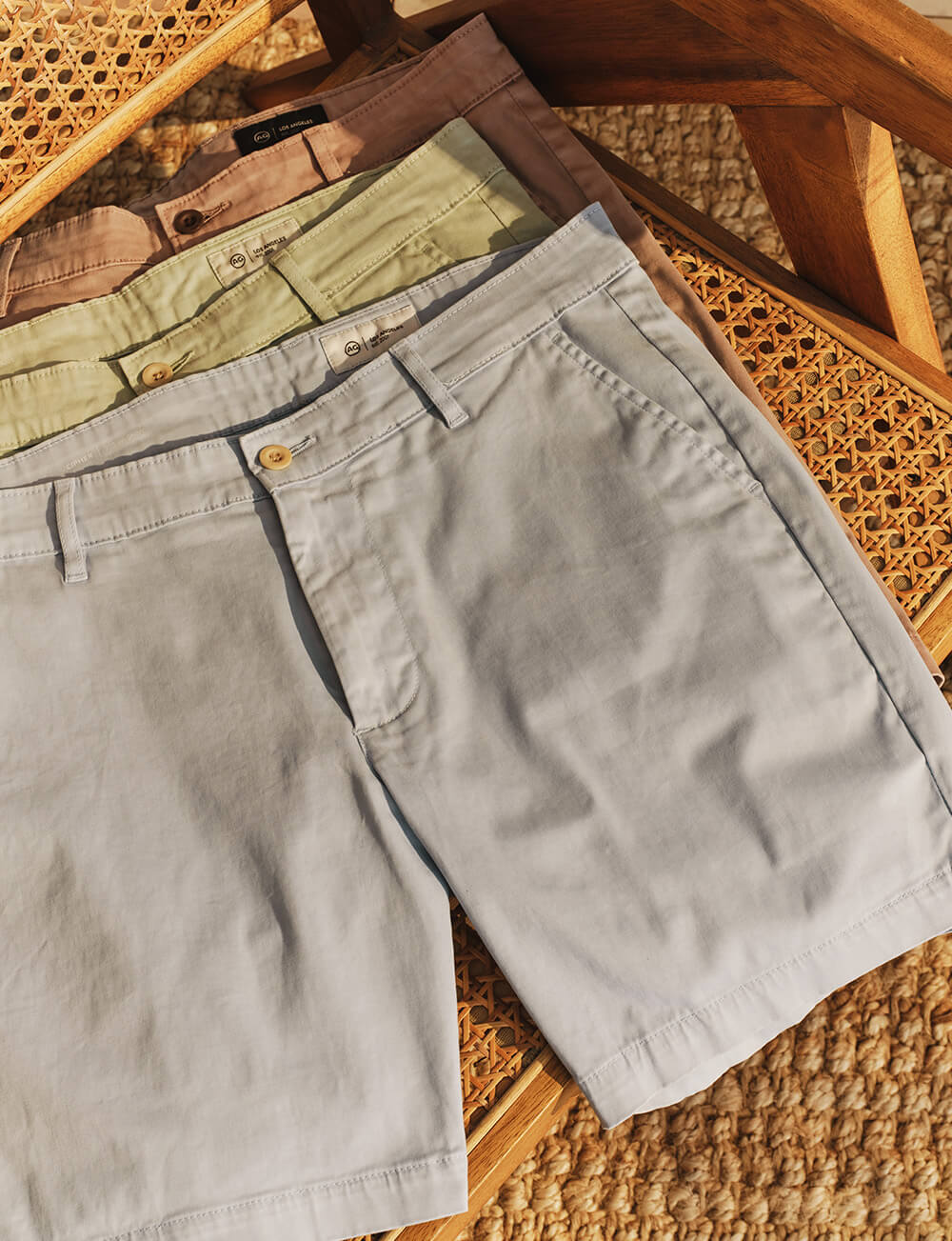stack of shorts on chair