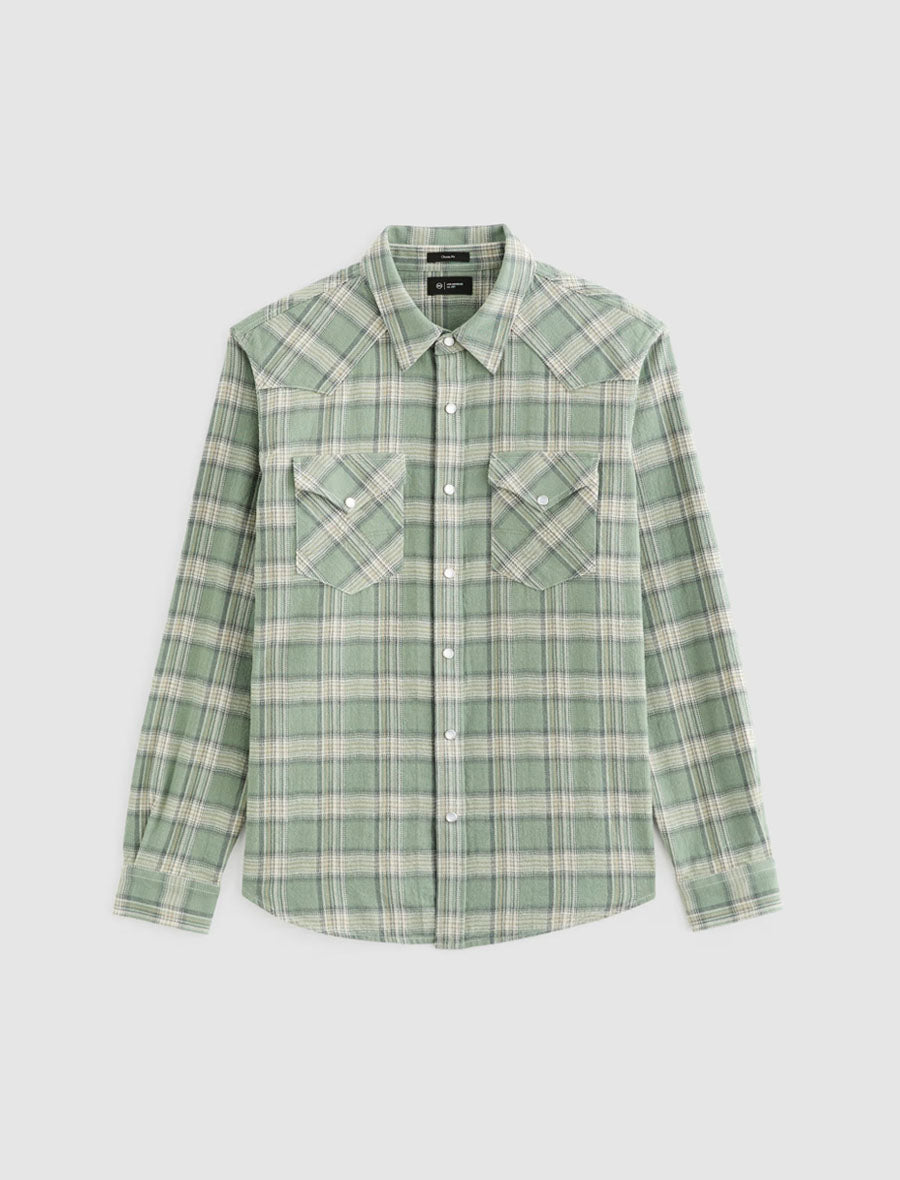 Green plaid shirt on a light gray background