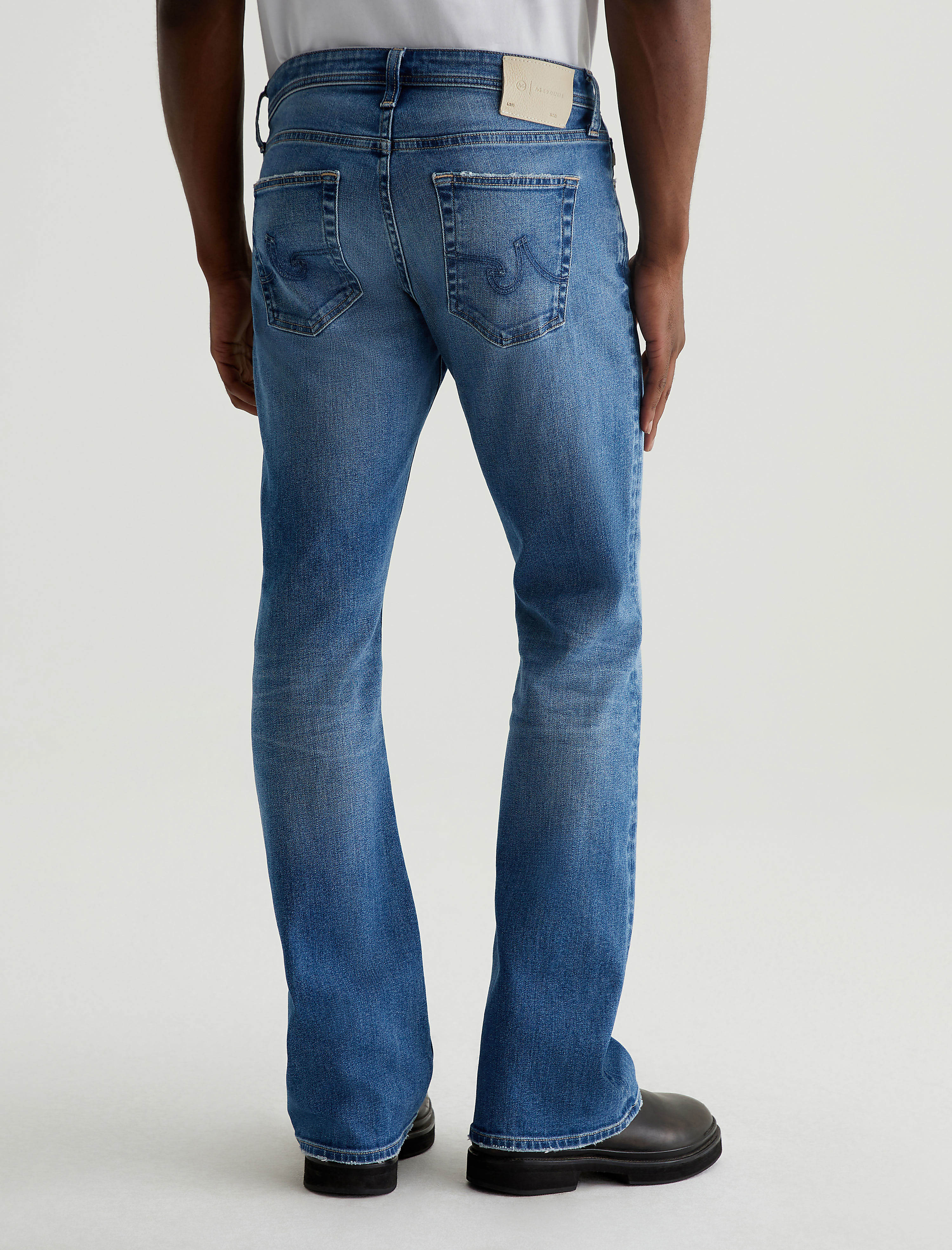 【DIAGONAL】CUTTING WIDE BOOTSCUT DENIM Men Clint Soledad at AG Jeans Official Store